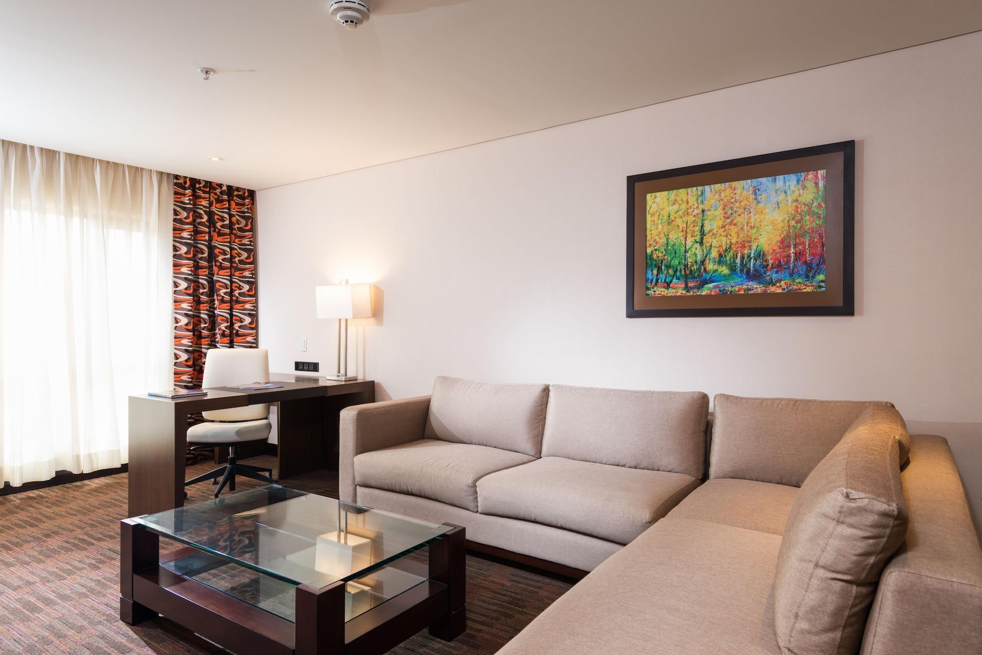 Casa Dann Carlton Hotel & Spa Bogota Exterior photo A living room in a hotel suite